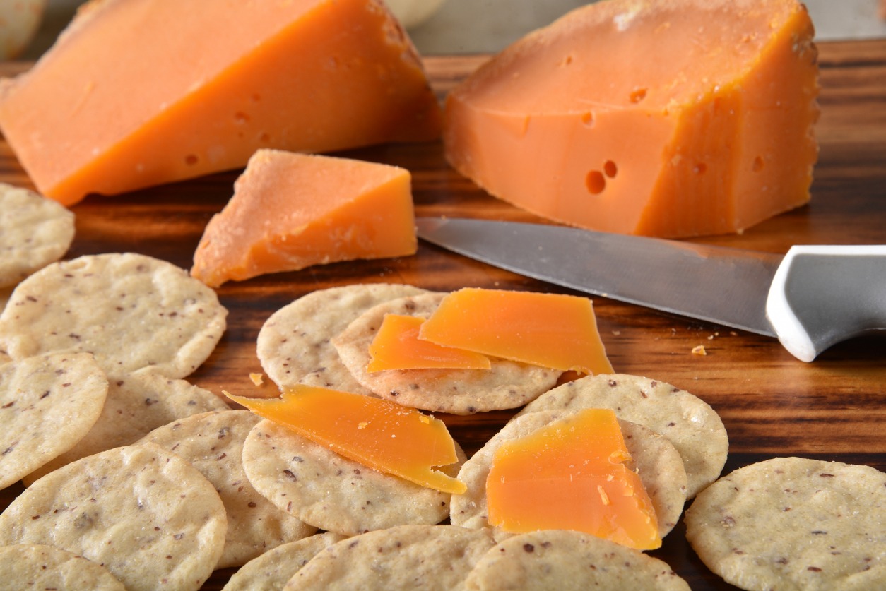 Gluten free rice crackers with gourmet Mimolette cheese