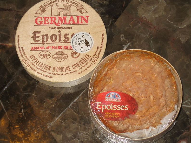 a small Epoisses cheese wheel